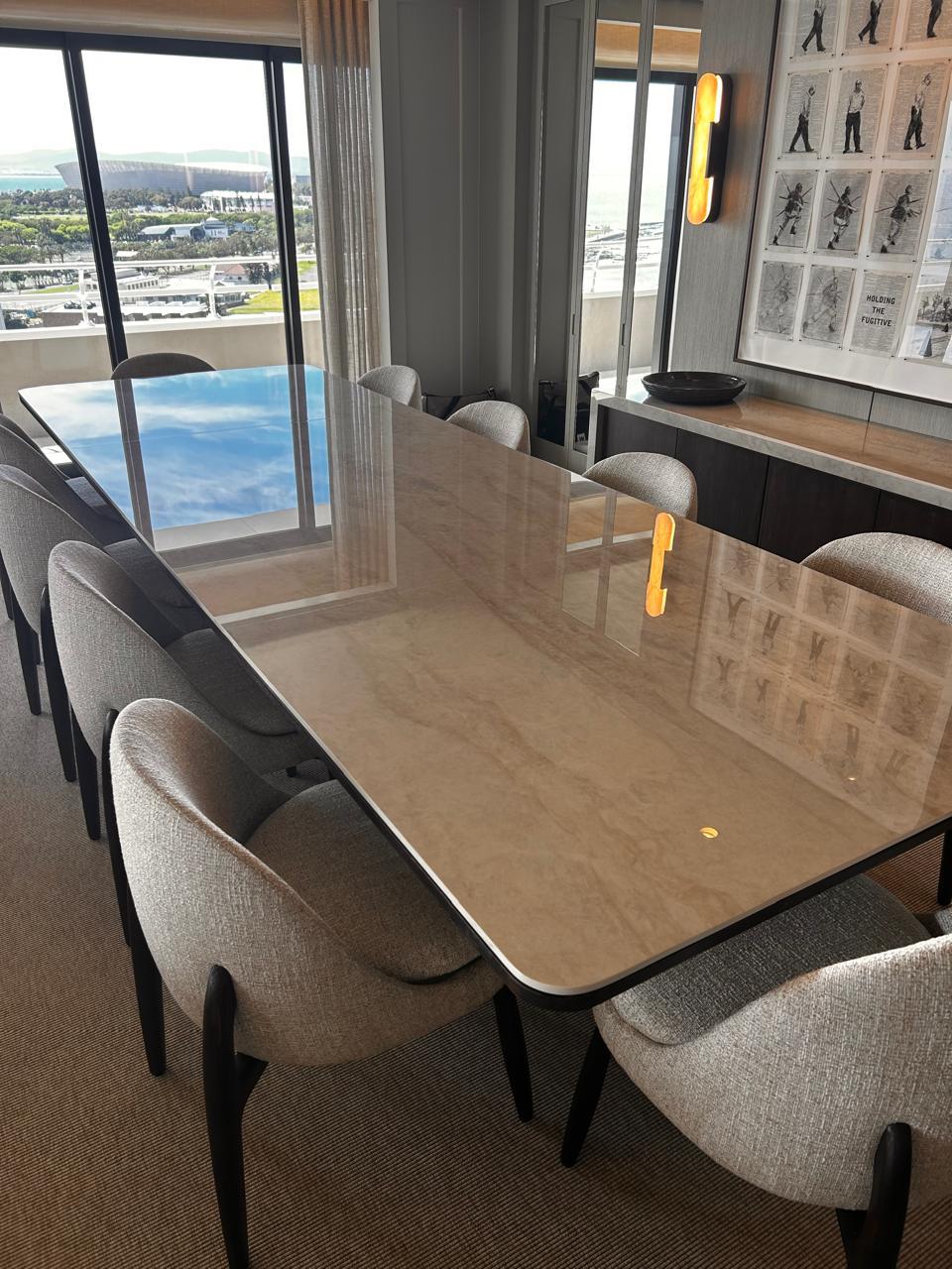 Natural stone dining table with polished top in a Cape Town apartment